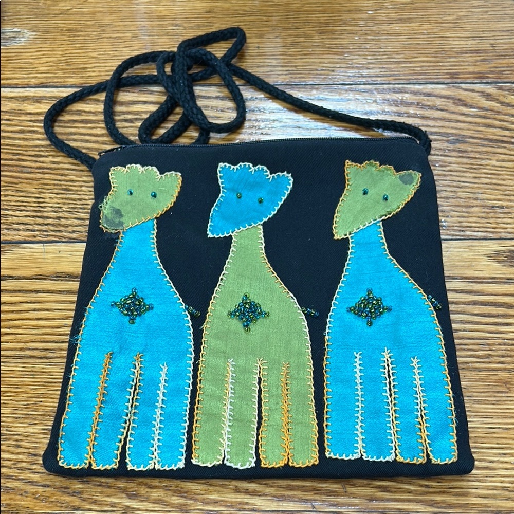 Vintage handcrafted appliqué crossbody/shoulder bag. Zip top. Giraffes .